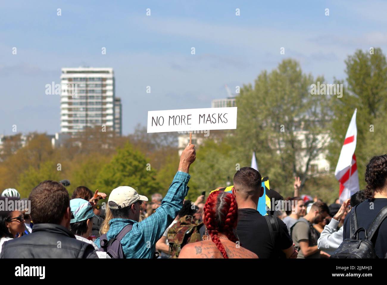 London, UK - April 24, 2021: 'Unite for Freedom' protest by covid-19 sceptics, demonstrators opposing lockdown, vaccination, mask-wearing, etc. Stock Photo