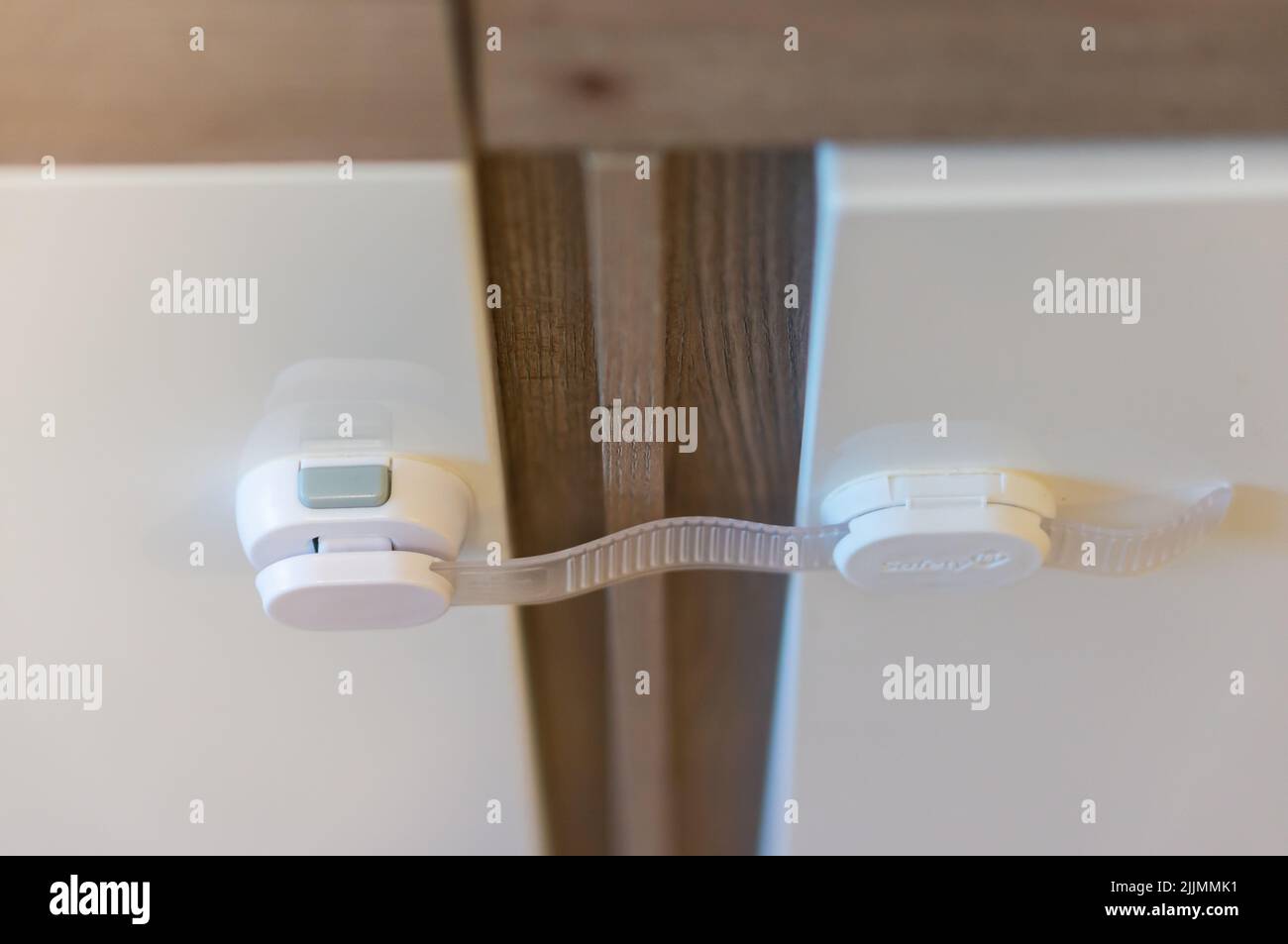 A secure lock on a closet door Stock Photo Alamy