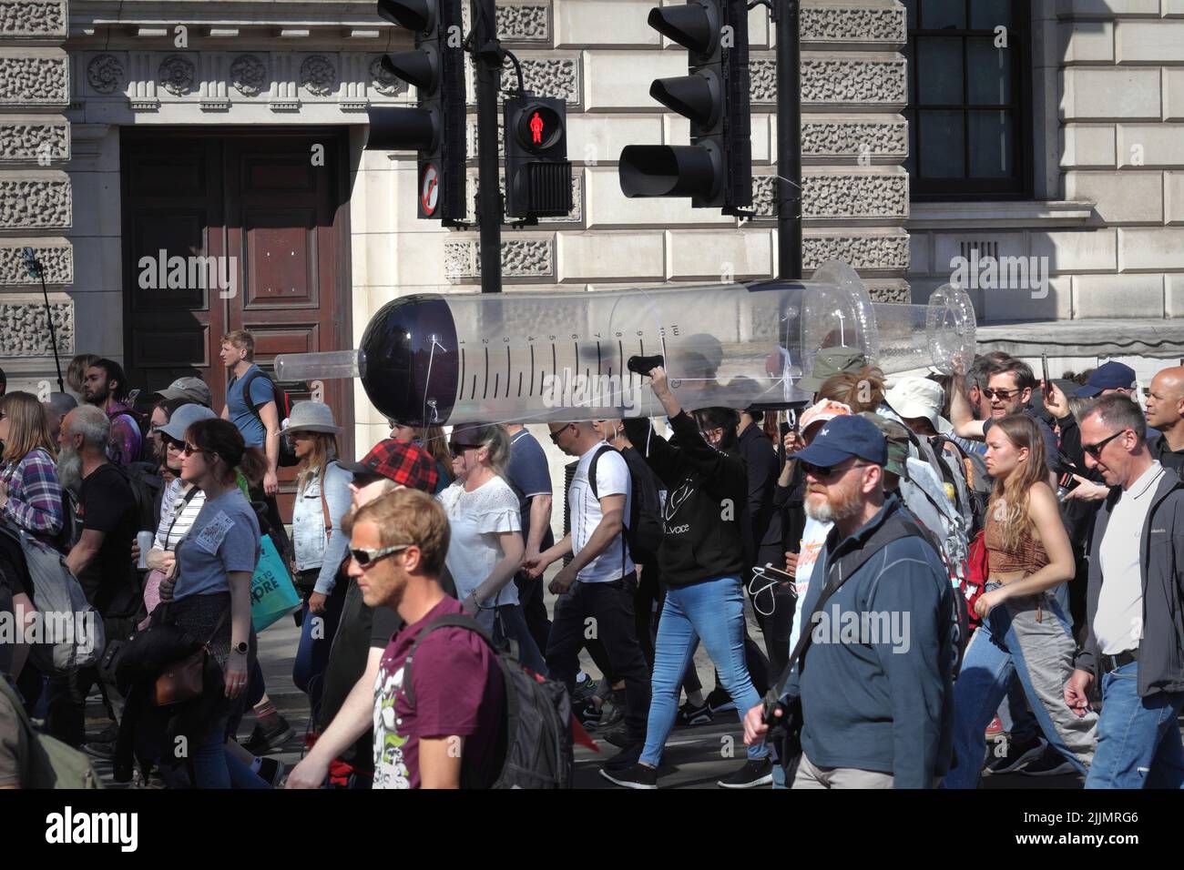 London, UK - April 24, 2021: 'Unite for Freedom' protest by covid-19 sceptics, demonstrators opposing lockdown, vaccination, mask-wearing, etc. Stock Photo