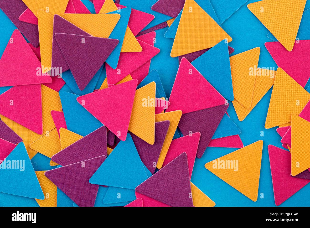 Abstract colorful geometrical composition background with random paper triangles Stock Photo