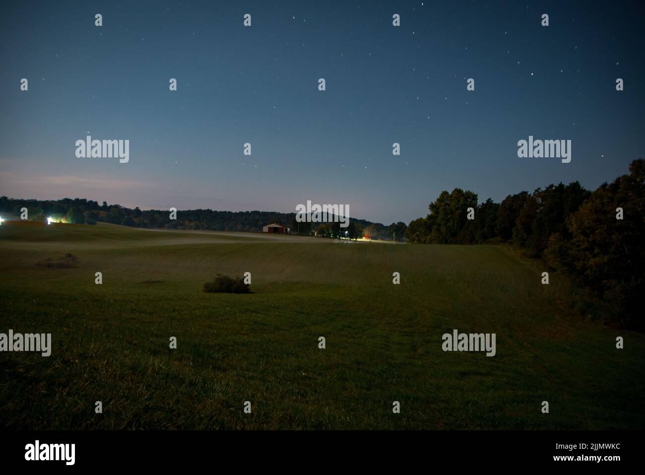 A field under the starry sky Stock Photo