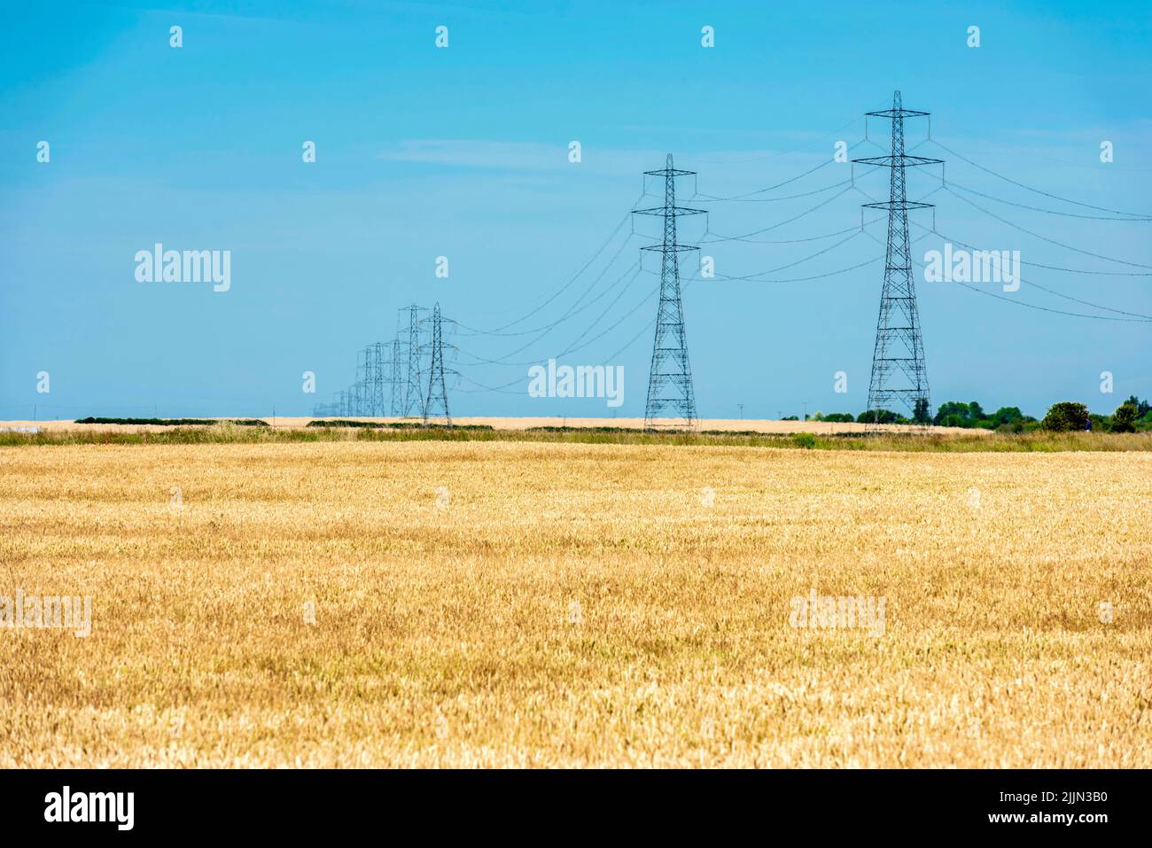 Power lines near Faversham in Kent, England Stock Photo