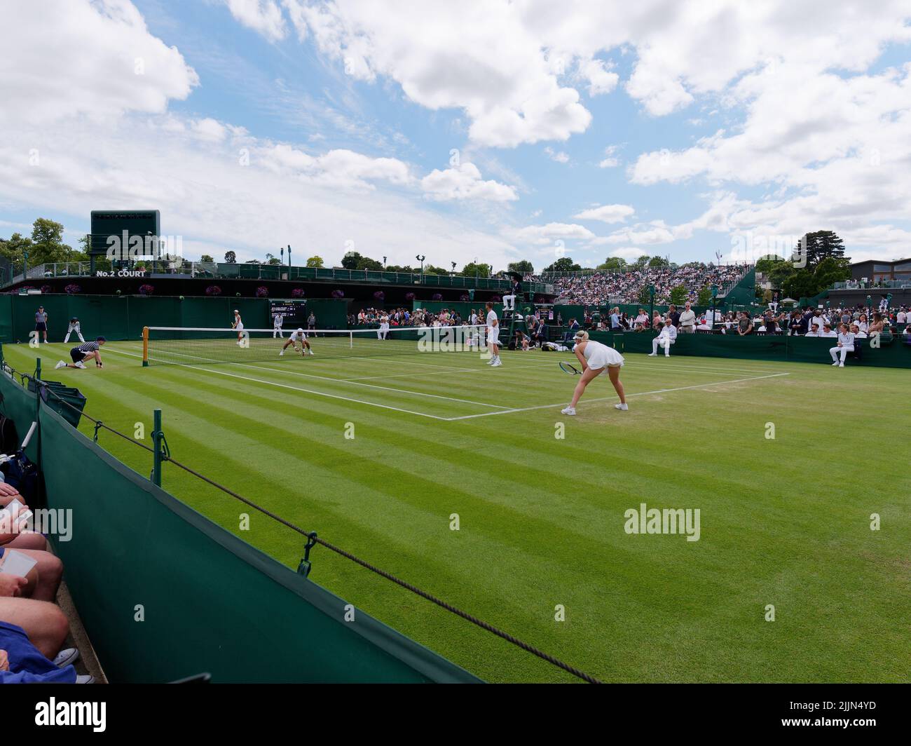 Wimbledon, Greater London, England, July 02 2022: Wimbledon Tennis Championship. Doubles match in progress. Stock Photo