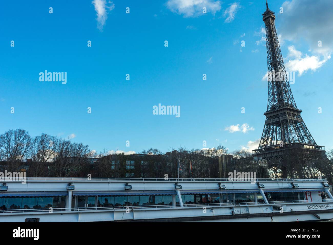 A view of the enchanting Eiffel Tower along with the Paris city skyline in France. Stock Photo