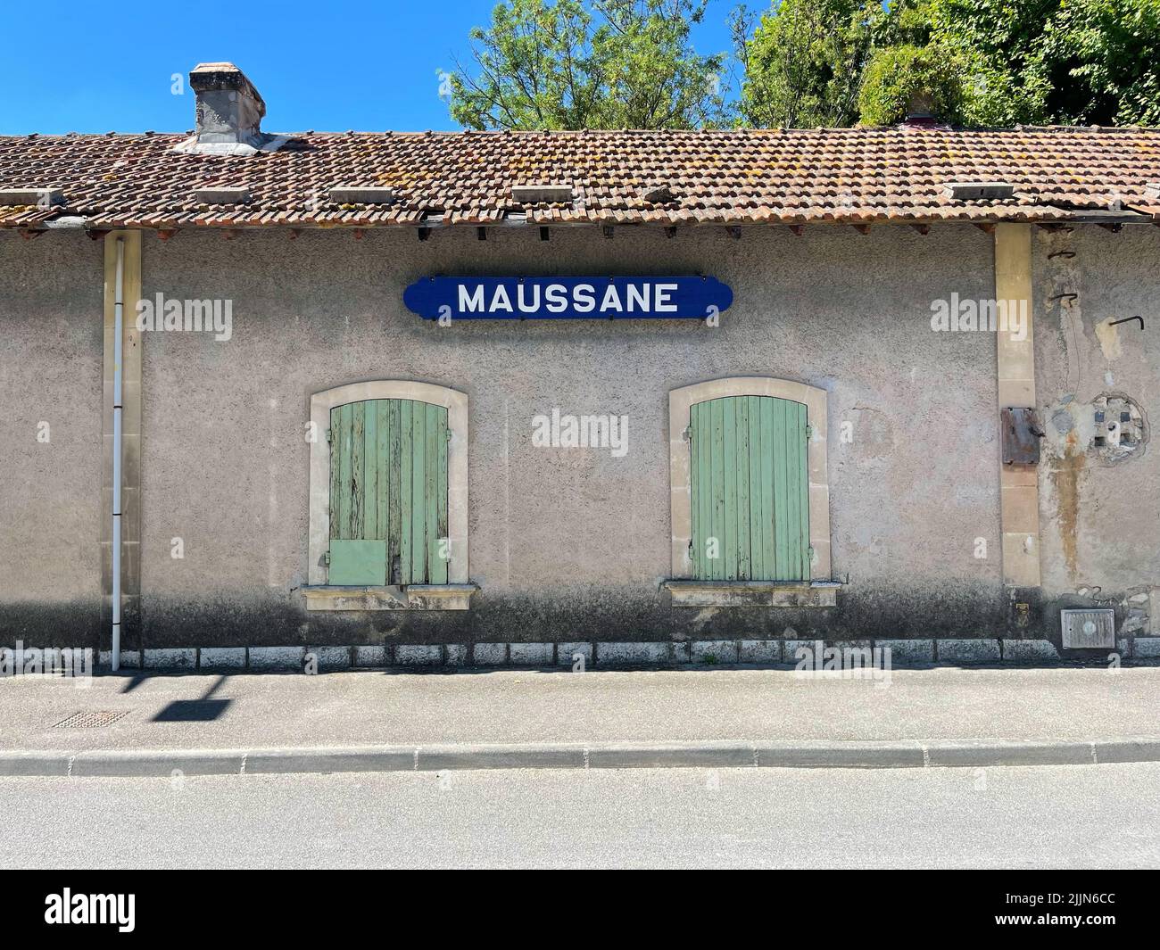 Maussane village sign on an old building, Maussane-les-Alpilles, Bouches-du-Rhone, Provence-Alpes-Cote-d'Azur, France Stock Photo