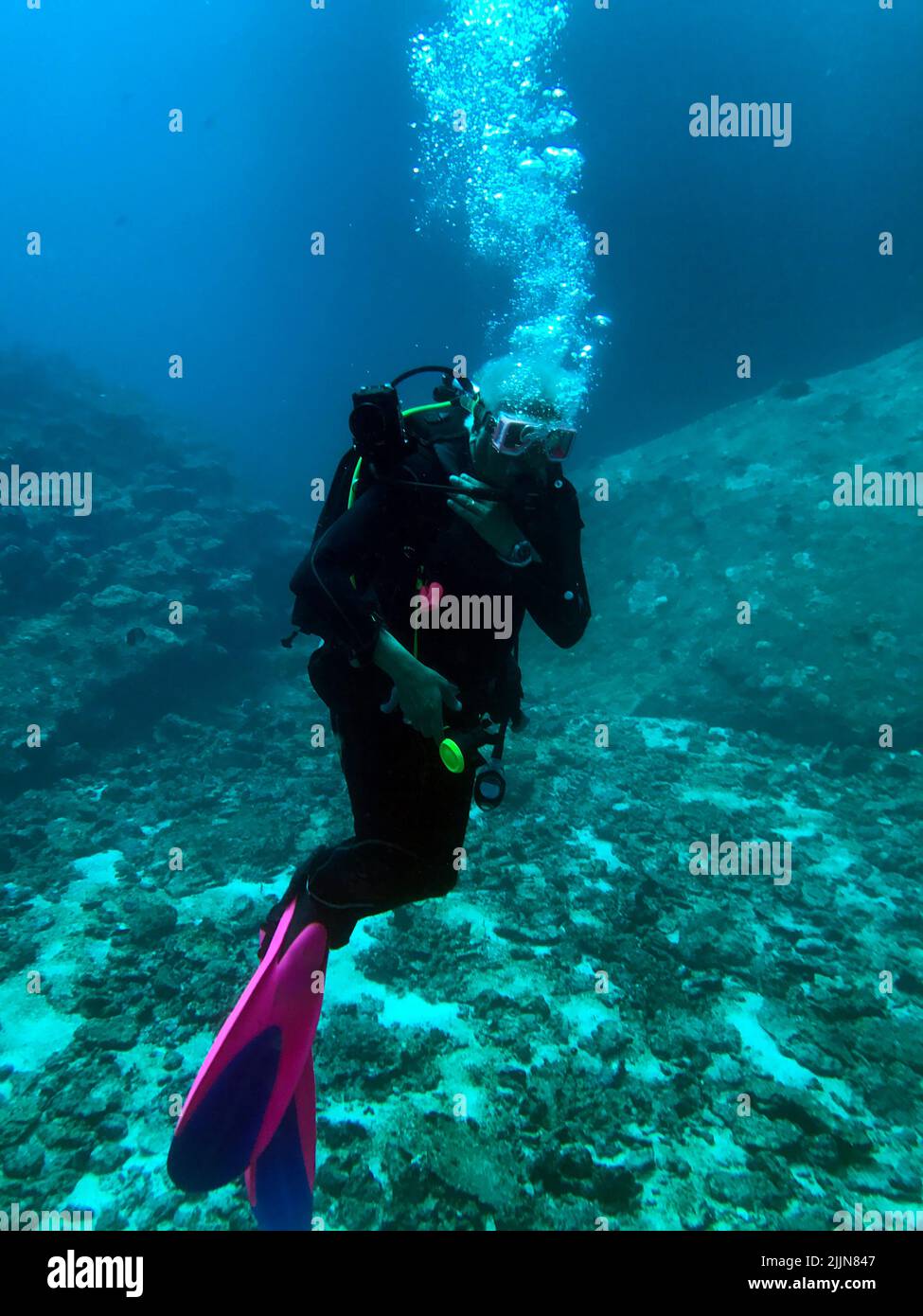 Senior man scuba diving in the Mu Ko Similan National Park, Similan Islands, Thailand Stock Photo
