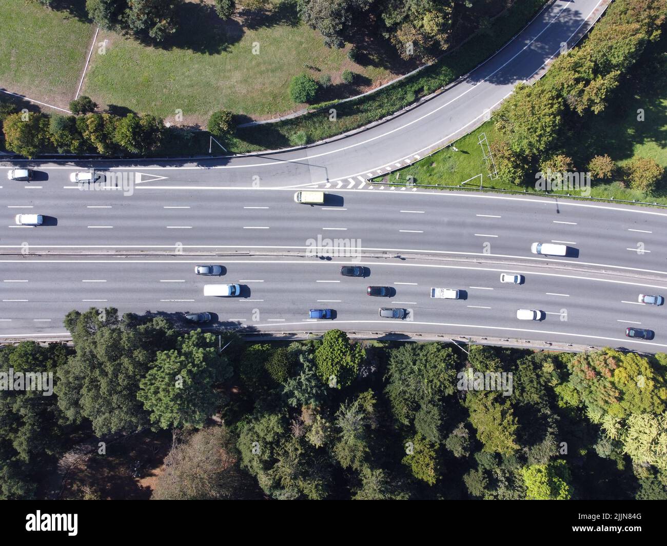 A top view of the highway surrounded by trees. Portugal Stock Photo