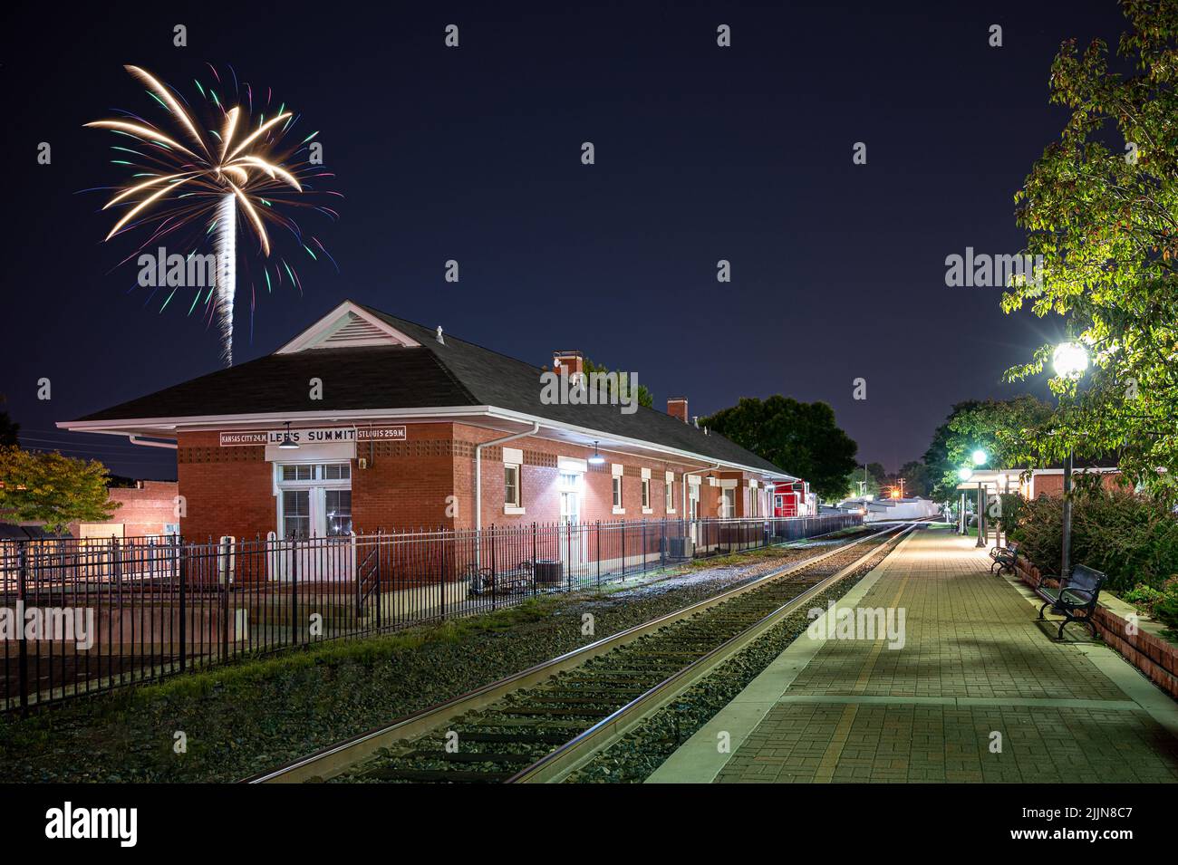 A beautiful shot of the fireworks bursting over railroad depot in Missouri, United States Stock Photo