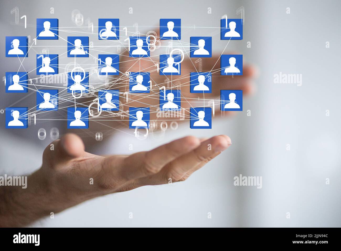 The 3d rendered profile icons hovering over a man's hand Stock Photo ...