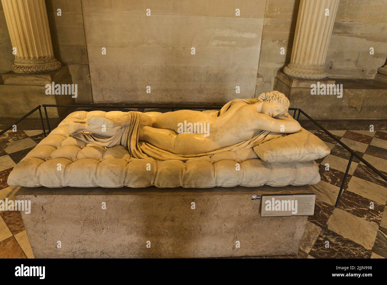 The historic sculpture of Hermaphroditus at the Louvre Museum in Paris ...