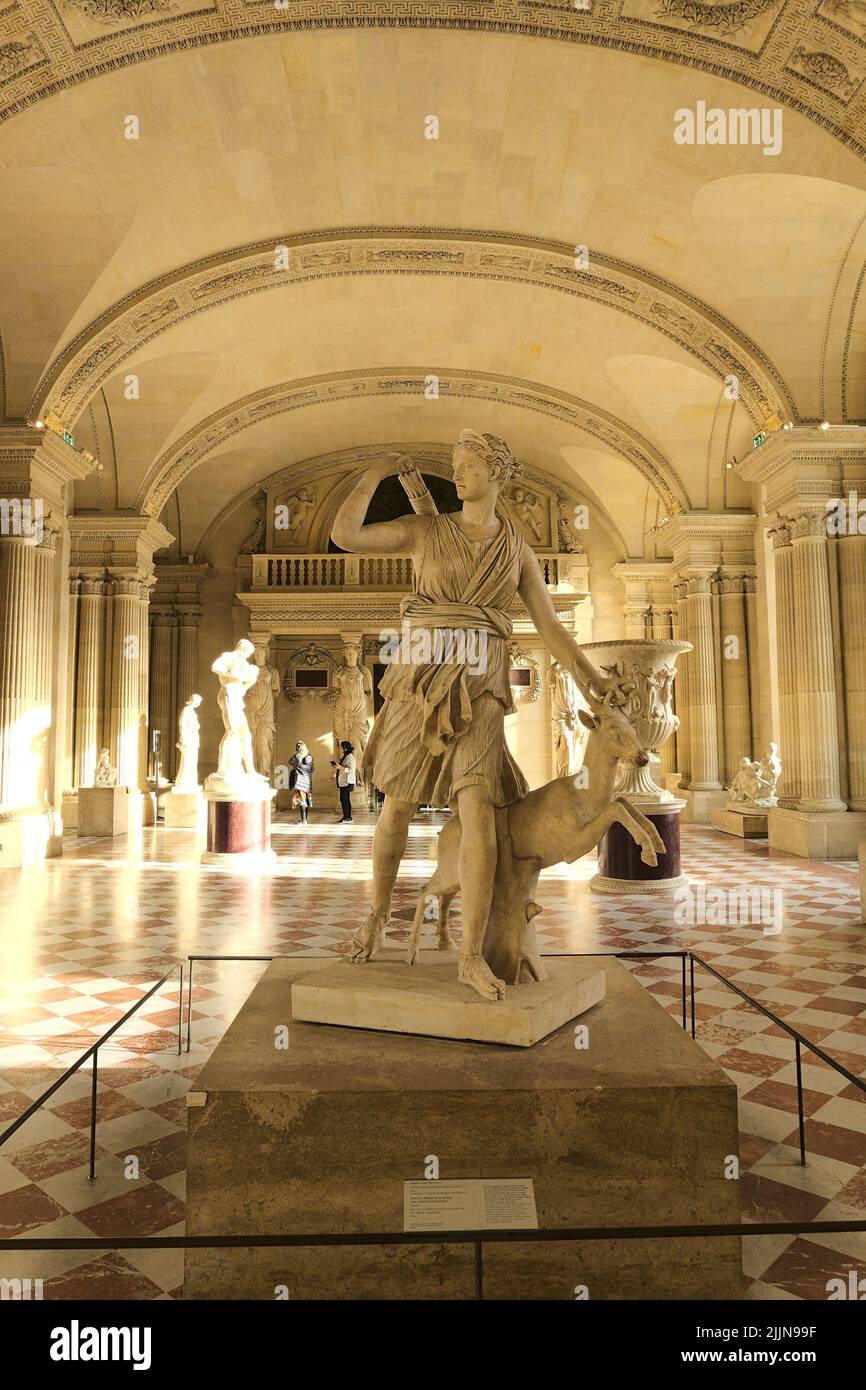 The Statue of Artemis - a young goddess of hunting, the goddess of fertility, in Louvre, Paris, France Stock Photo
