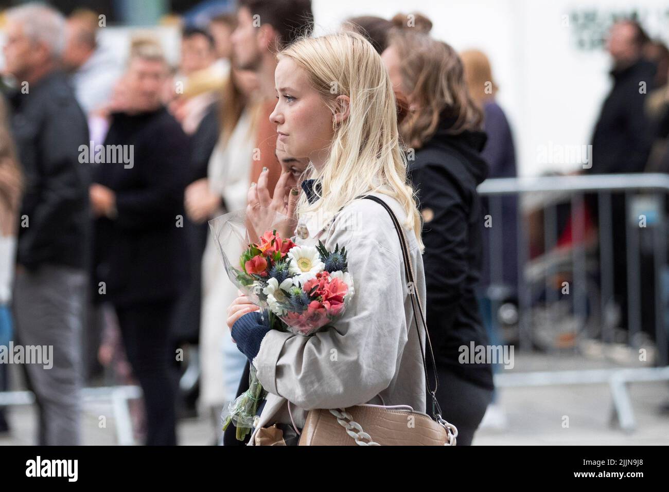 Copenhagen -05/07/2022. Thousands of people gather to lay flowers and pay their respects at the Field Mall in Copenhagen, after mass shooting. Stock Photo