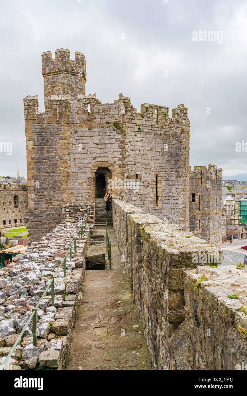 CAERNARFON, WALES JULY 08, 2022 View of Caernarfon Castle ruins, a