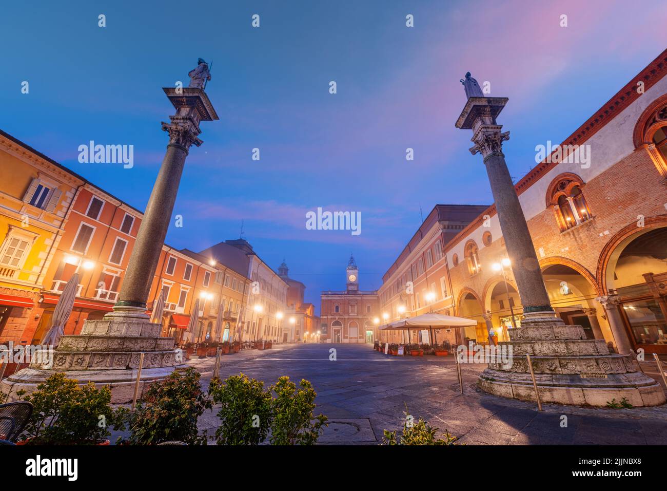 Ravenna, Italy at Piazza del Popolo with the landmark Venetian columns at dusk. Stock Photo