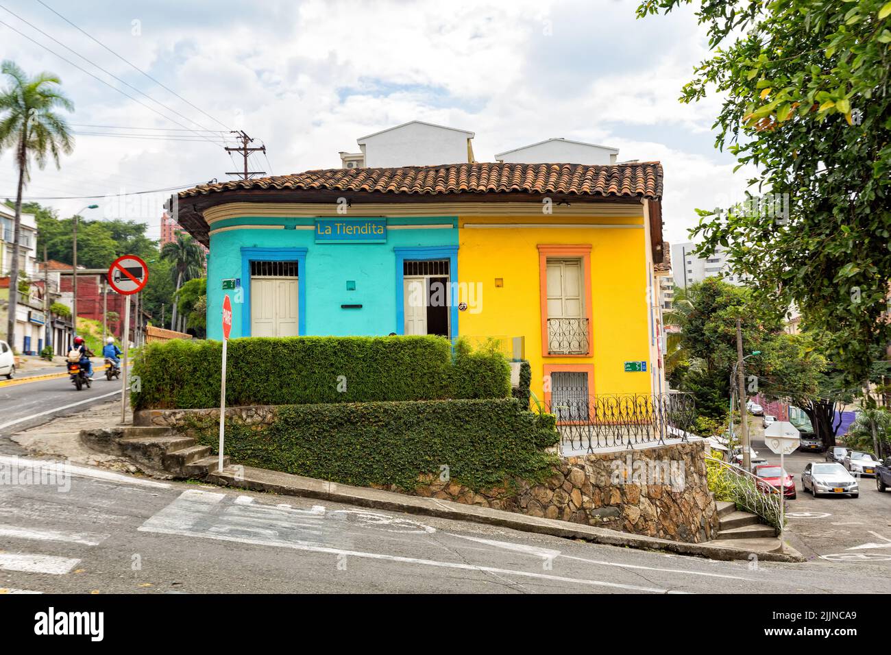 The Brightly painted green and yellow house in Cali, Colombia Stock Photo