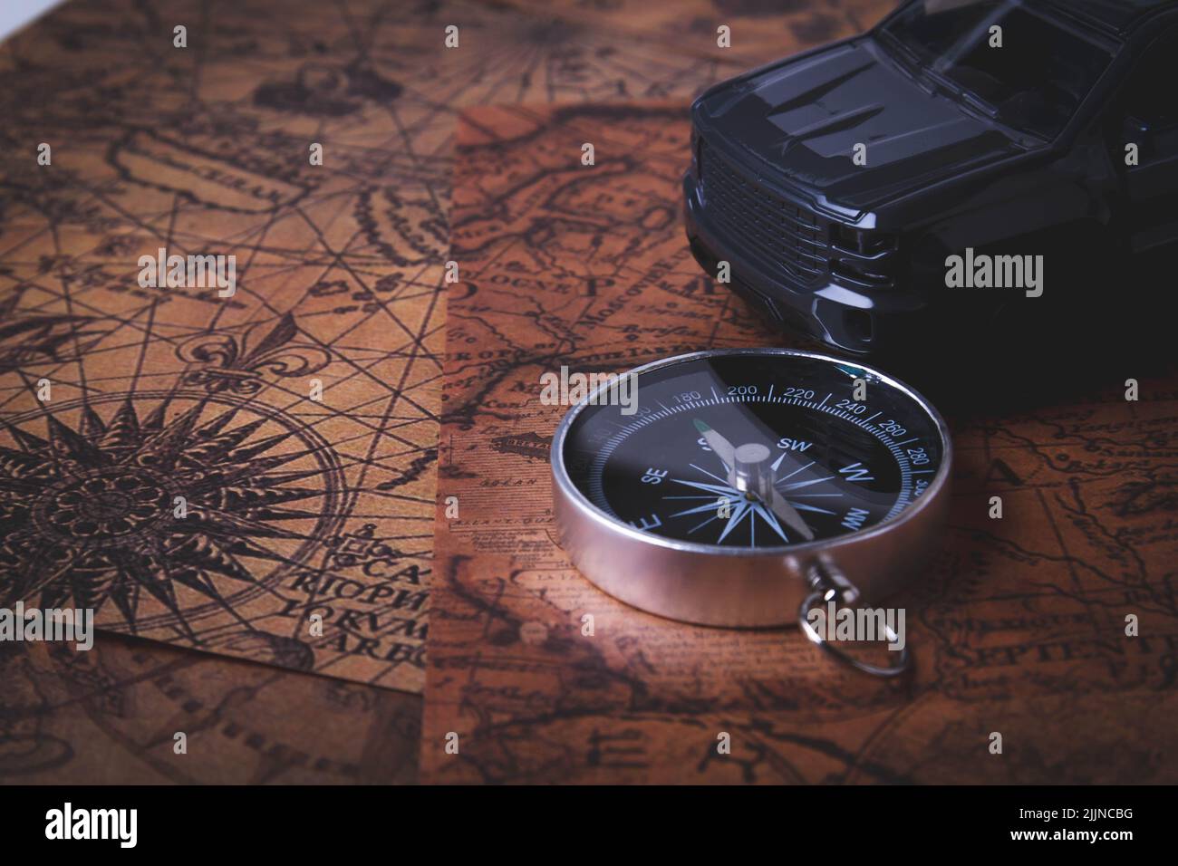 Tourist travel by car. Travel by car. Compass and car. Autotourism