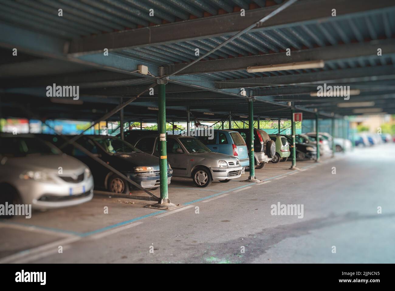 Two-level car parking in Italy. Stock Photo