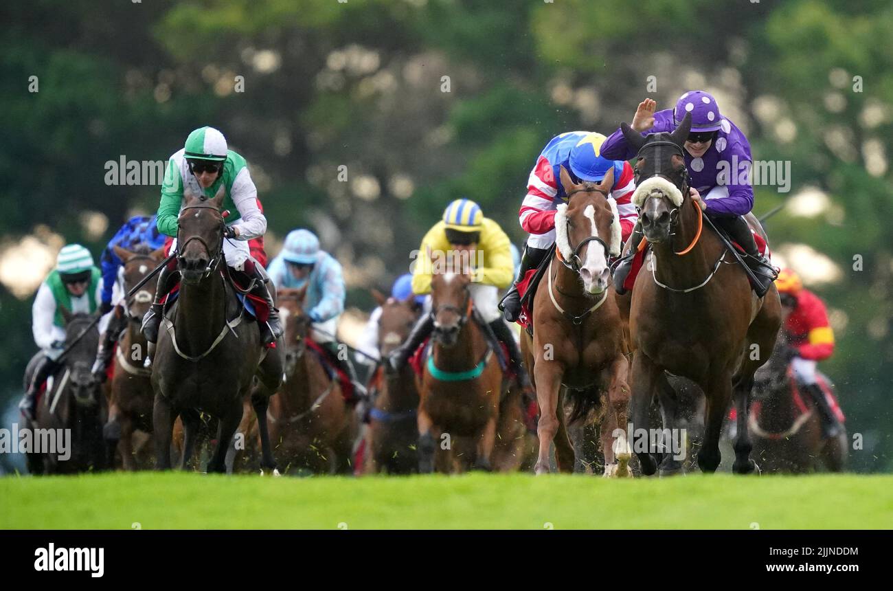 Outback Flyer and jockey Kevin Sexton (right, purple) wins the Free Jackpot All Customers At Tote.ie Irish EBF Mares Handicap Hurdle during day three of the Galway Races Summer Festival 2022 at Galway Racecourse in County Galway, Ireland. Picture date: Wednesday July 27, 2022. Stock Photo
