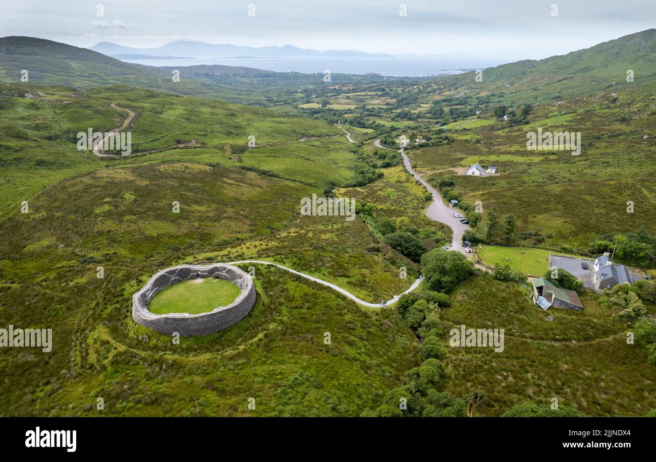 Aerial view of ruined Staigue stone fort Iveragh peninsula in County Kerry, Ireland. Drone Landscape Stock Photo