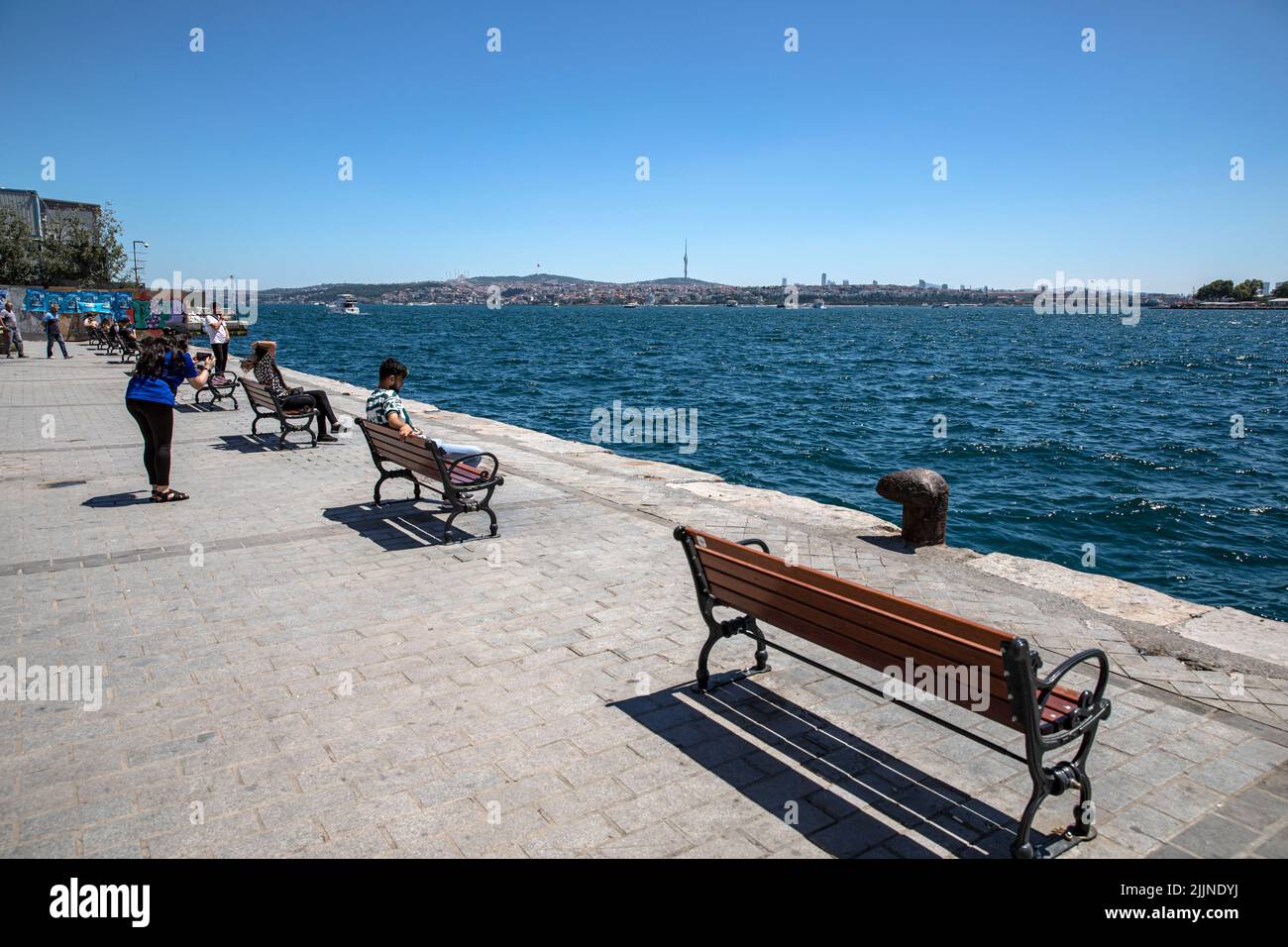 The crowd of people at Karakoy dock and its surroundings is less compared to other days due to the high temperatures. Stock Photo