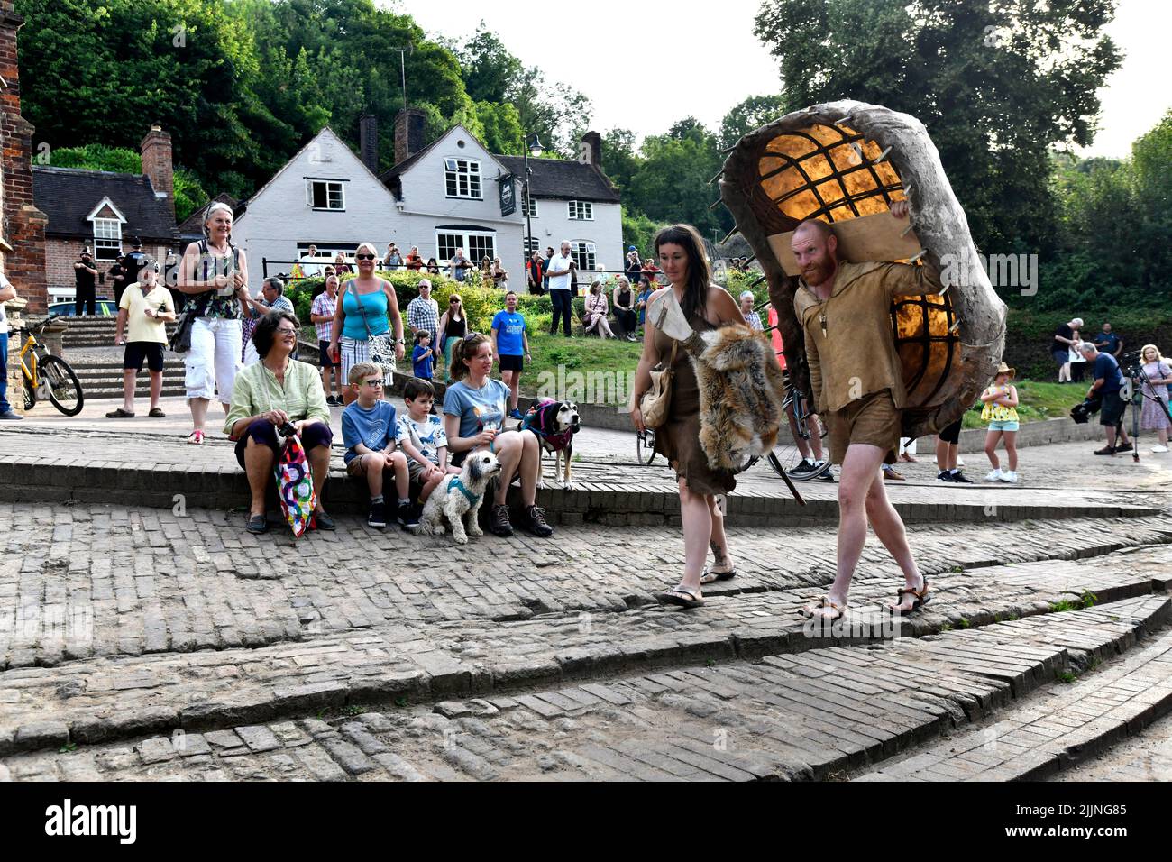 TV stars from the Channel Four programme 'Surviving the Stone Age' Naomi and Dan Walmsley at  Queen's Baton Relay passing through Ironbridge. Stock Photo
