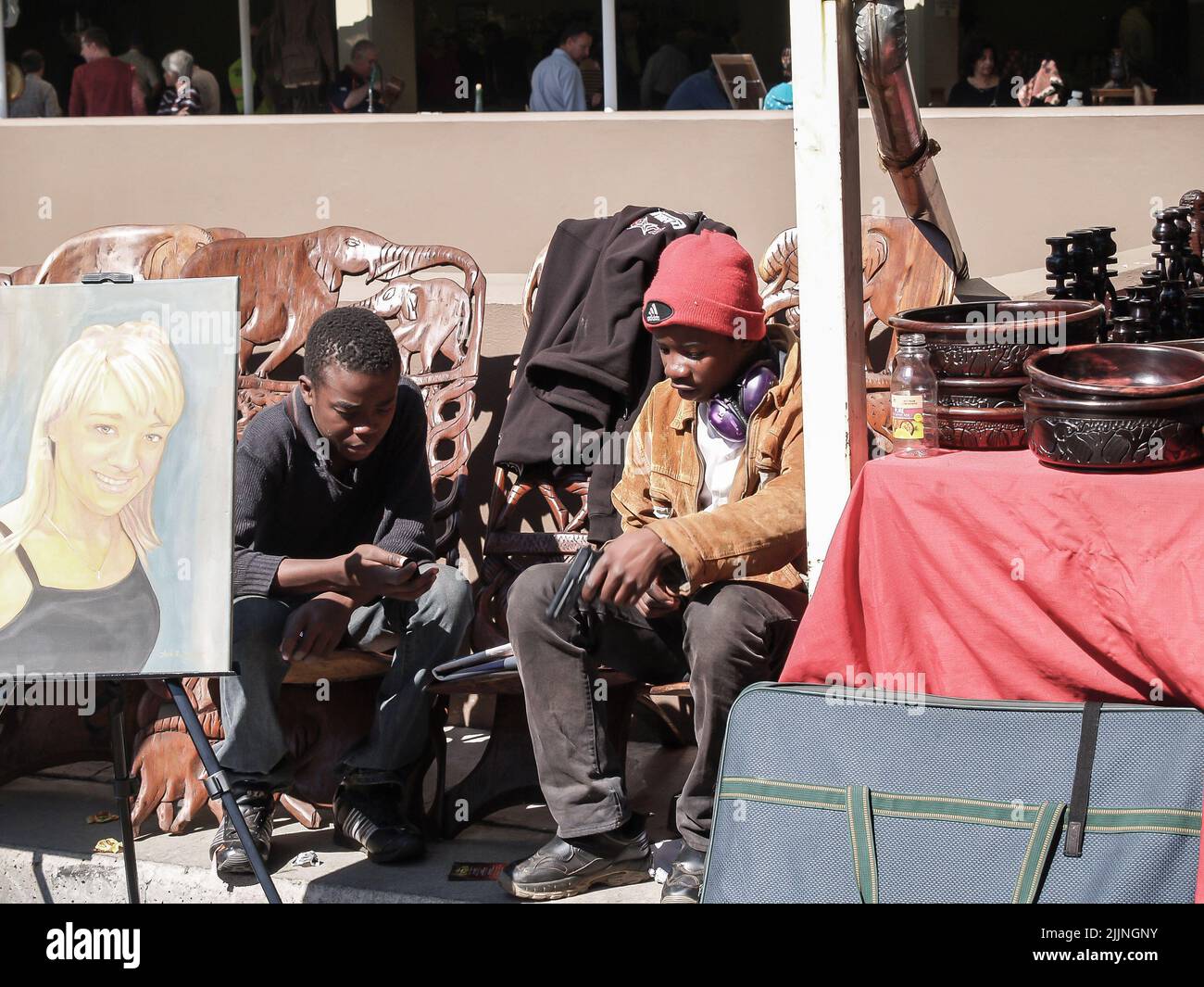Johannesburg South Africa August 12 2027; Two young men sitting in