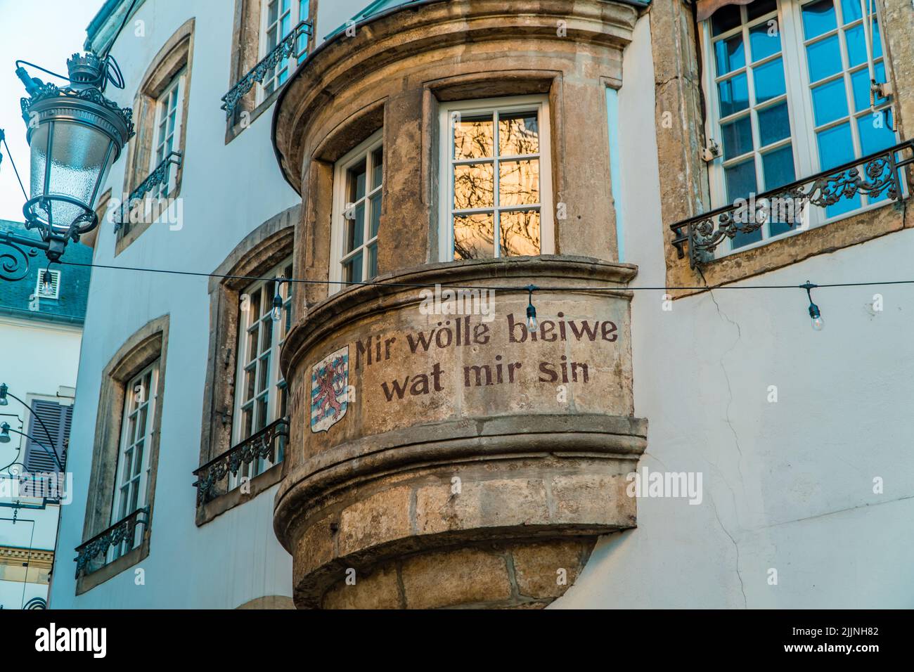 A Luxembourg national motto - we want to remain what we area on medieval houses Stock Photo