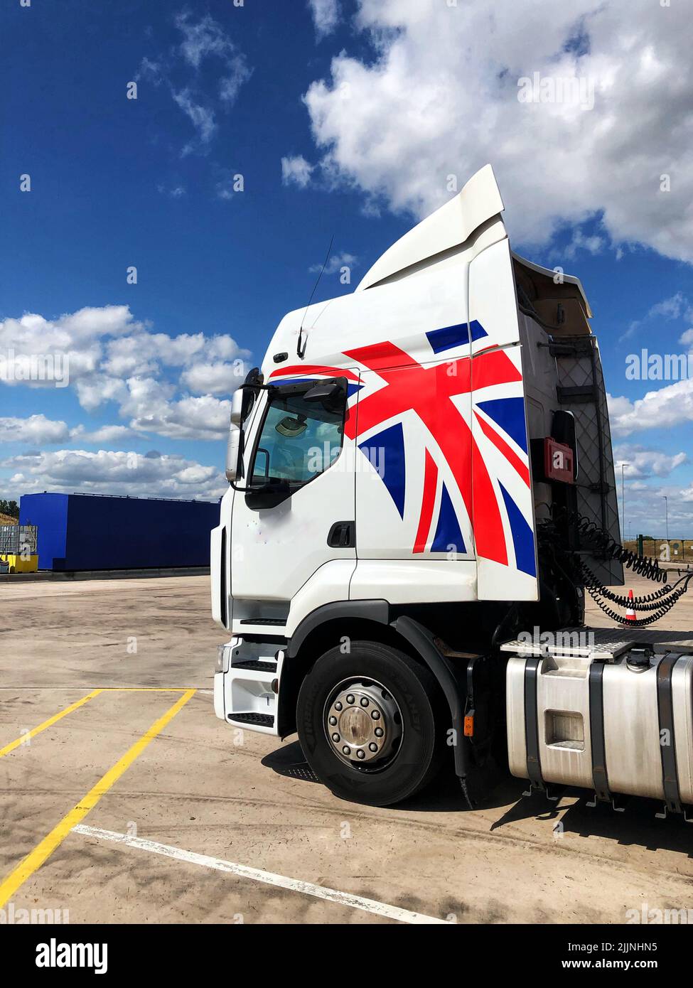 A lorry or truck cab of a British haulage company with a patriotic Union Jack flag painted on the profile Stock Photo