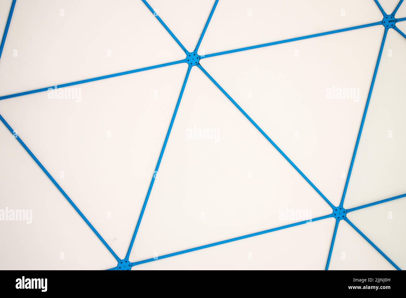 A background of the blue dome's metal structure made with some triangles Stock Photo