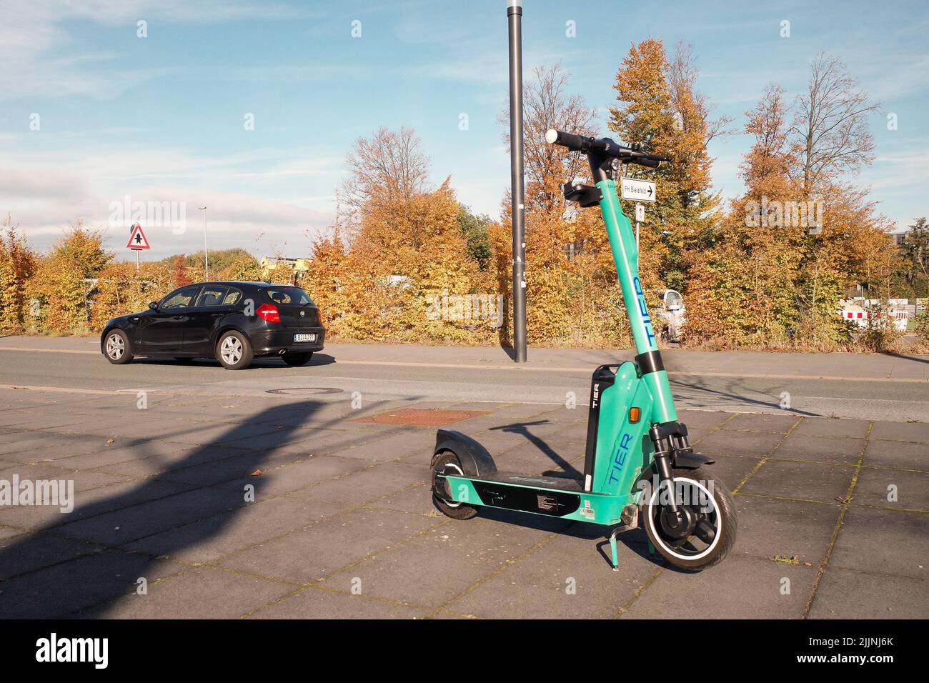 A selective focus shot of a parked scooter in Bielefeld, Germany Stock Photo