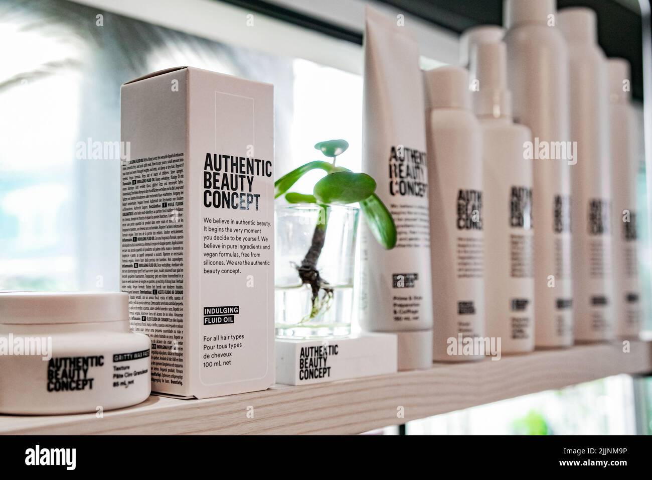 A closeup of Authentic Beauty Concept products on display in hair salon in Cape Town, South Africa Stock Photo