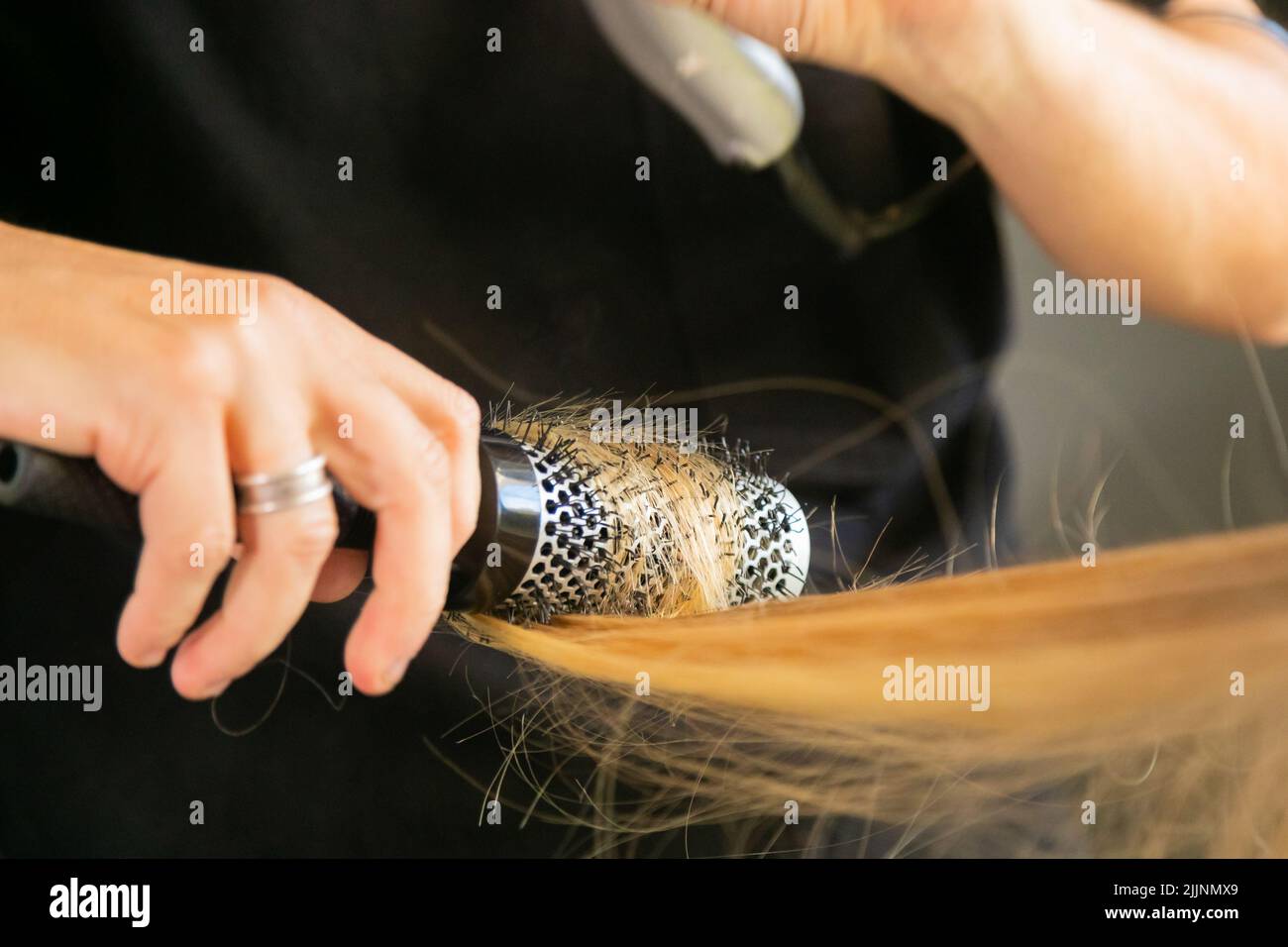 Female hair stylist working hi-res stock photography and images - Alamy