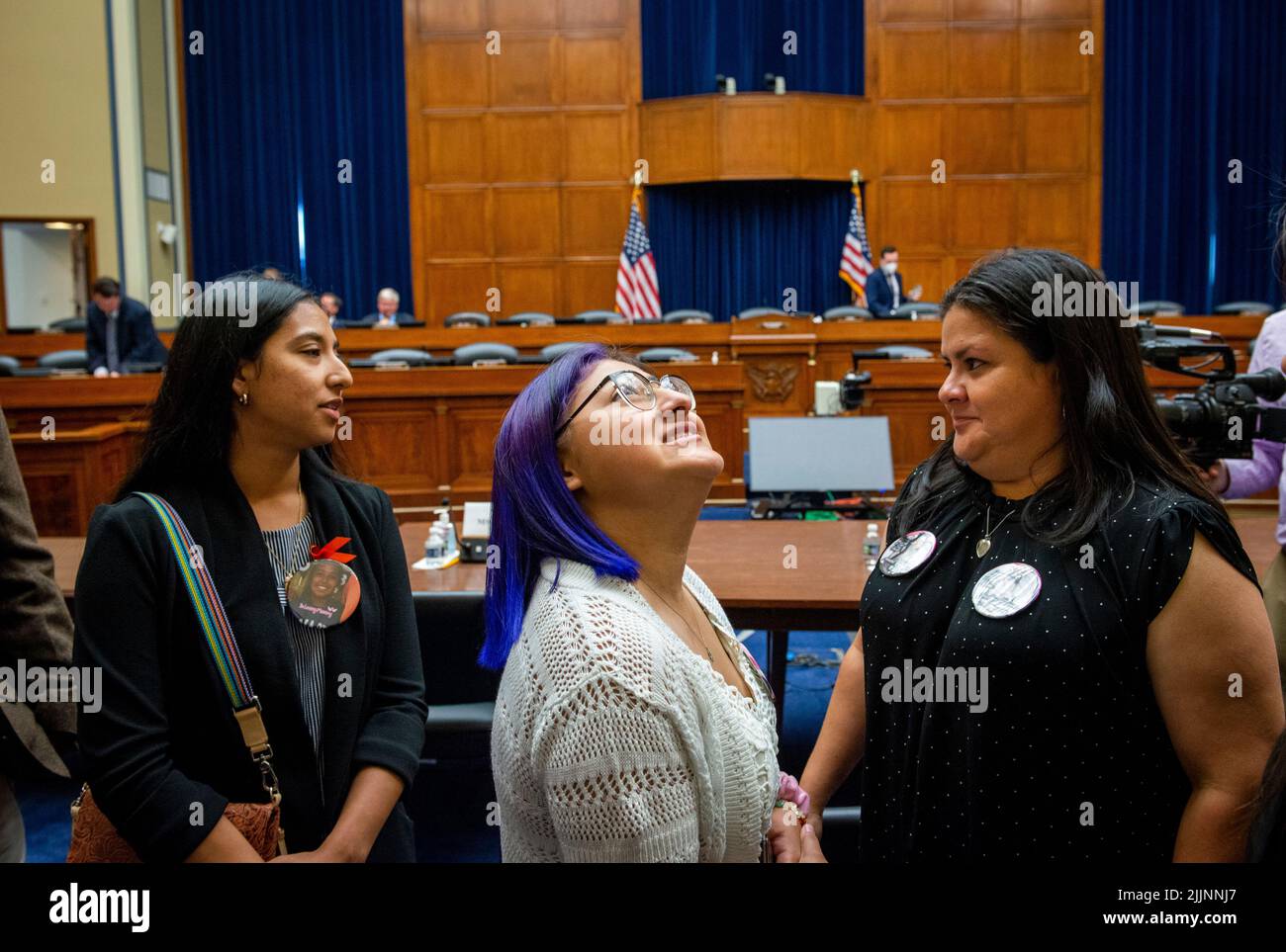 Jazmin Cazares, center, whose nine year-old sister Jacklyn Cazares, was one of the children killed by a gunman at Robb Elementary School in Uvalde, Texas, talks with her mother Gloria Cazares, right, and Kimberly Rubio, left, whose daughter Alexandria Rubio was one of the children killed by a gunman at Robb Elementary School in Uvalde, Texas, during a recess in a House Committee on Oversight and Reform hearing “Examining the Practices and Profits of Gun Manufacturers” in the Rayburn House Office Building in Washington, DC, July 27, 2022. Credit: Rod Lamkey/CNP /MediaPunch Stock Photo