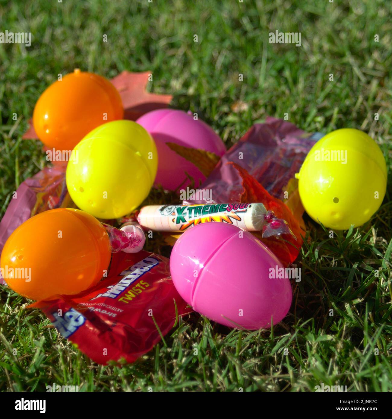 Colorful plastic eggs candies hi-res stock photography and images - Alamy