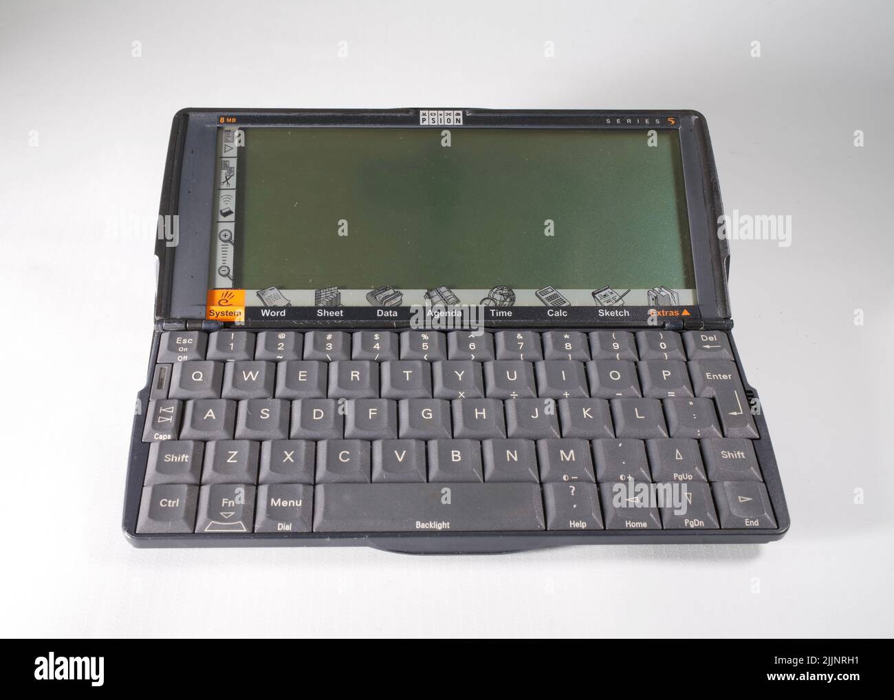 A closeup of a vintage Psion Series 5 palmtop computer from 1997 on the white background Stock Photo
