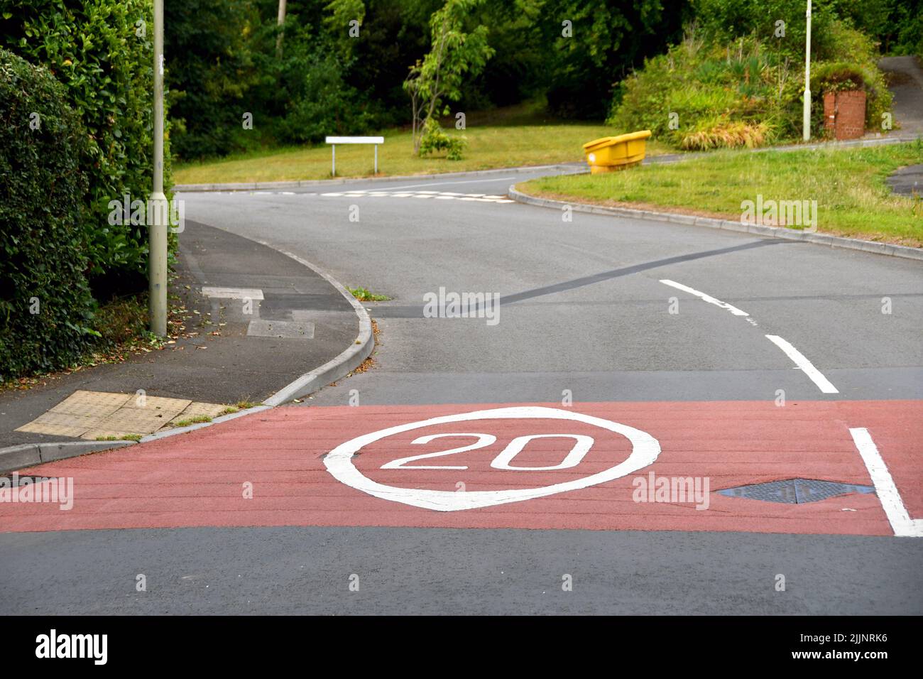 Road markings showing a 20 mph speed limit at the approach to a residential area Stock Photo Alamy