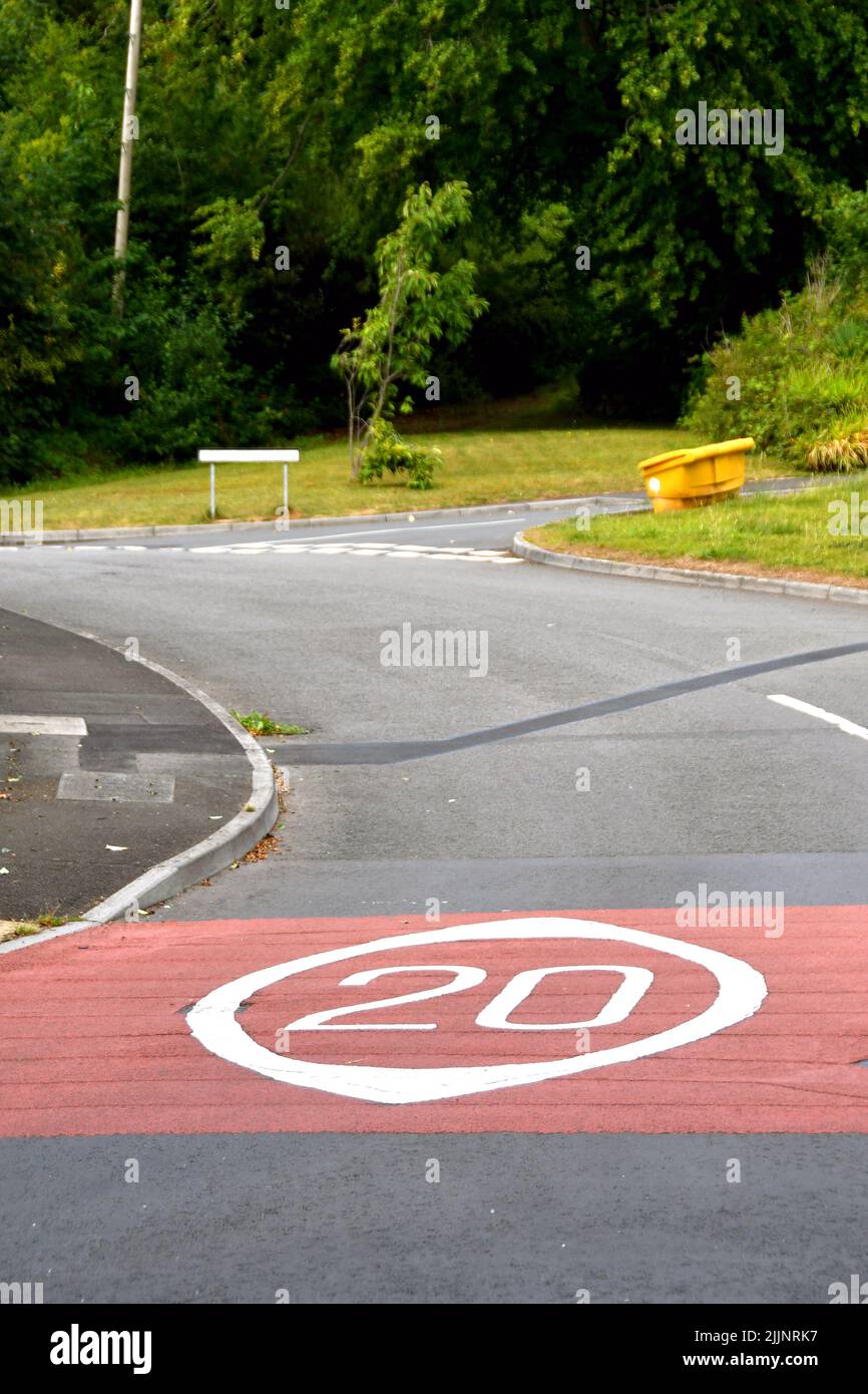 Road markings showing a 20 mph speed limit at the approach to a residential area Stock Photo Alamy