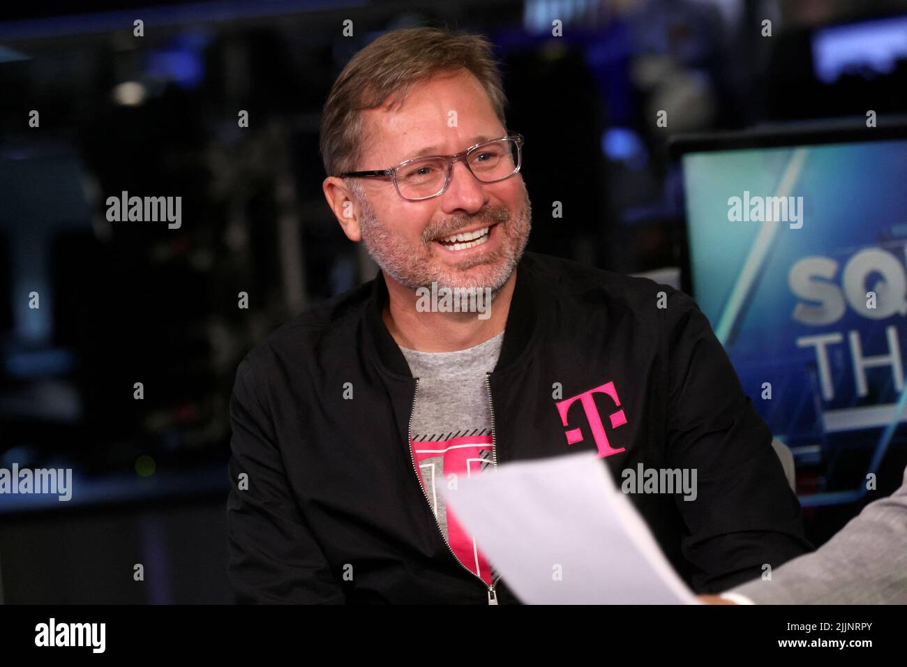 Mike Sievert, president and CEO of T-Mobile, speaks during an interview on CNBC on the floor of the New York Stock Exchange (NYSE) in New York City, U.S., July 27, 2022.  REUTERS/Brendan McDermid Stock Photo