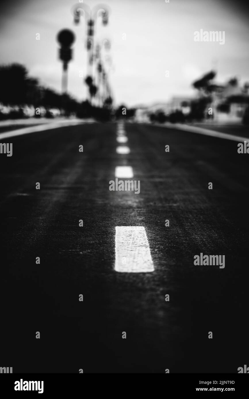A vertical greyscale of a highway Stock Photo