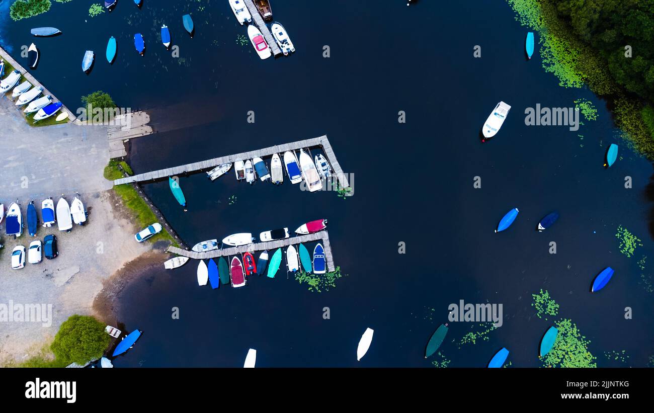 A drone view of boats in the water in Loch Lomond, Scotland Stock Photo