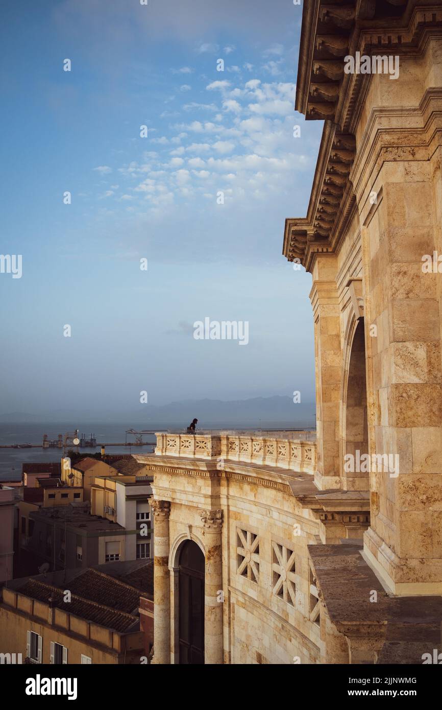 A vertical shot of Saint Remy bastione in background of buildings under ...