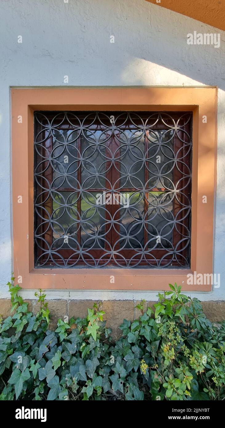 A vertical closeup of a window railing Stock Photo - Alamy