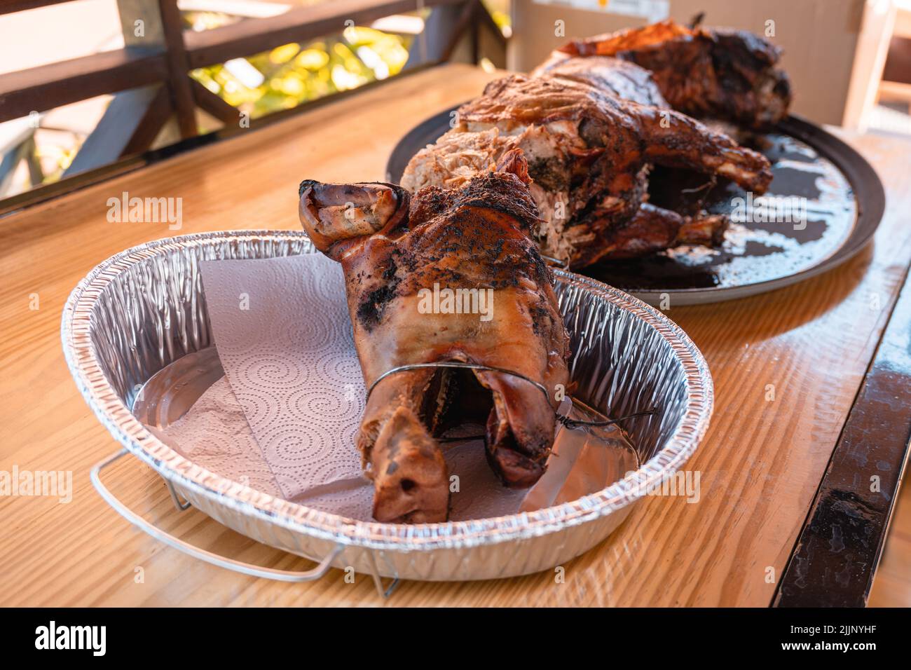 The roasted goat on the plate ready to serve Stock Photo Alamy