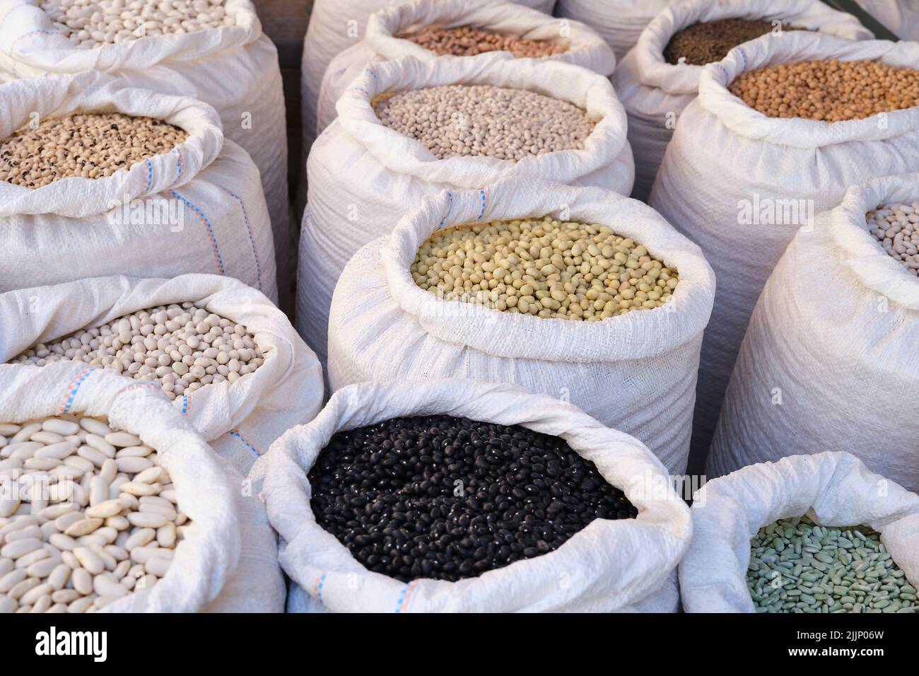 Aerial view of various types of legumes in open sacks at a local vegan market Stock Photo