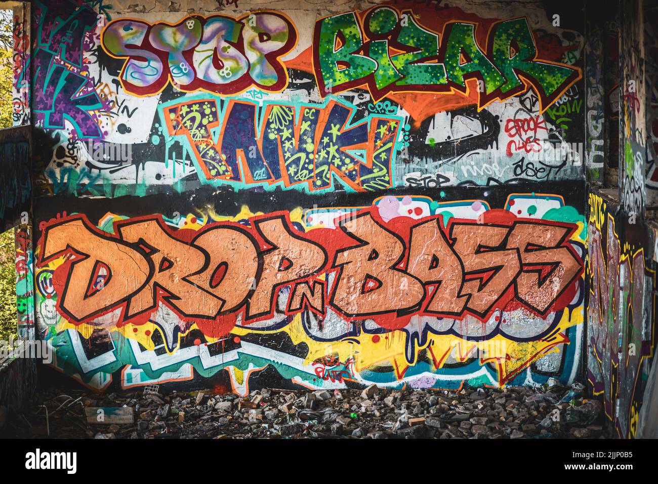 A view of an abandoned old police station covered in graffiti. Stock Photo