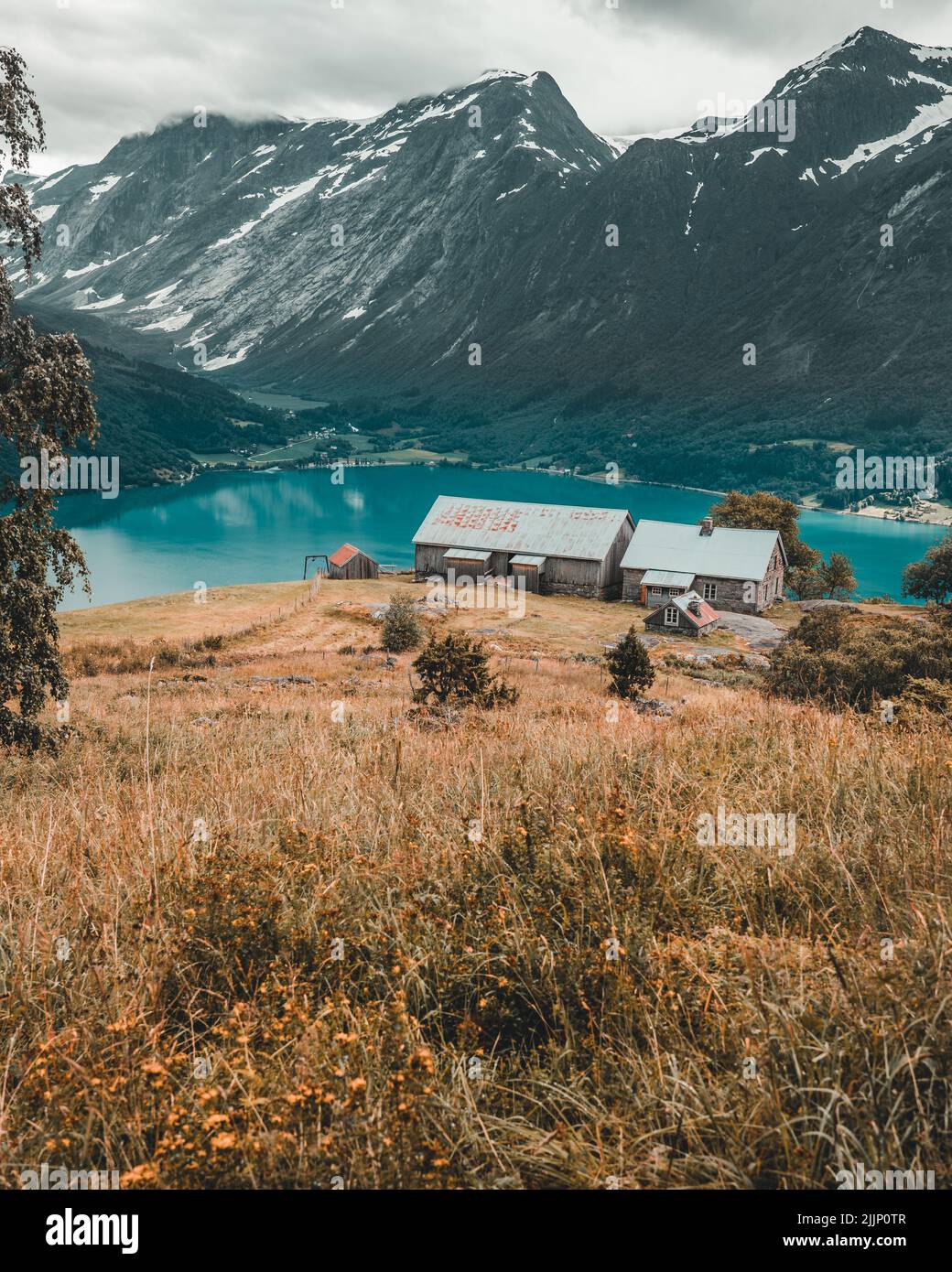 A view of cabins in Hjelle and segestad mountain farm in Oppstryn Stock