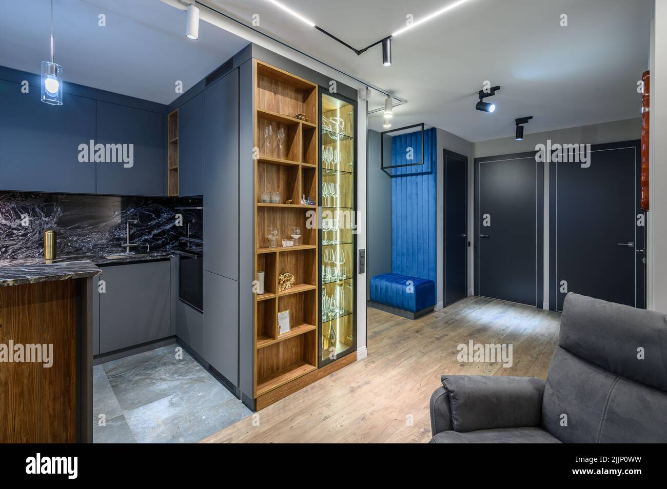 Luxury living room and kitchen in studio apartment Stock Photo - Alamy