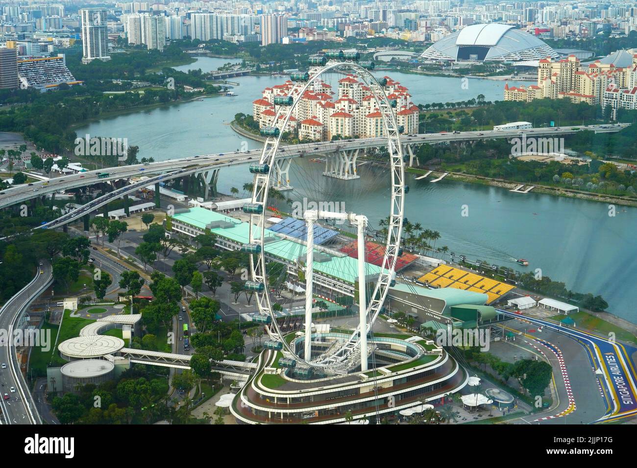 An aerial shot of the big Ferris Wheel at the Marina Bay Garden in