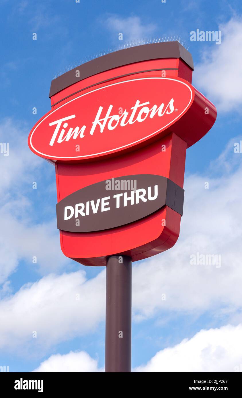 Tim Hortons Drive Thru Restaurant sign, The Galleries Retail Park,  Washington, Tyne and Wear, England, United Kingdom Stock Photo