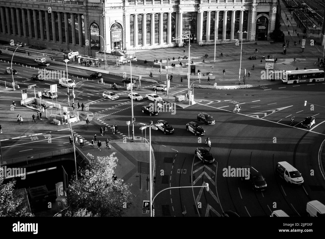 A grayscale shot of traffic on intersection, Barcelona, Spain Stock Photo